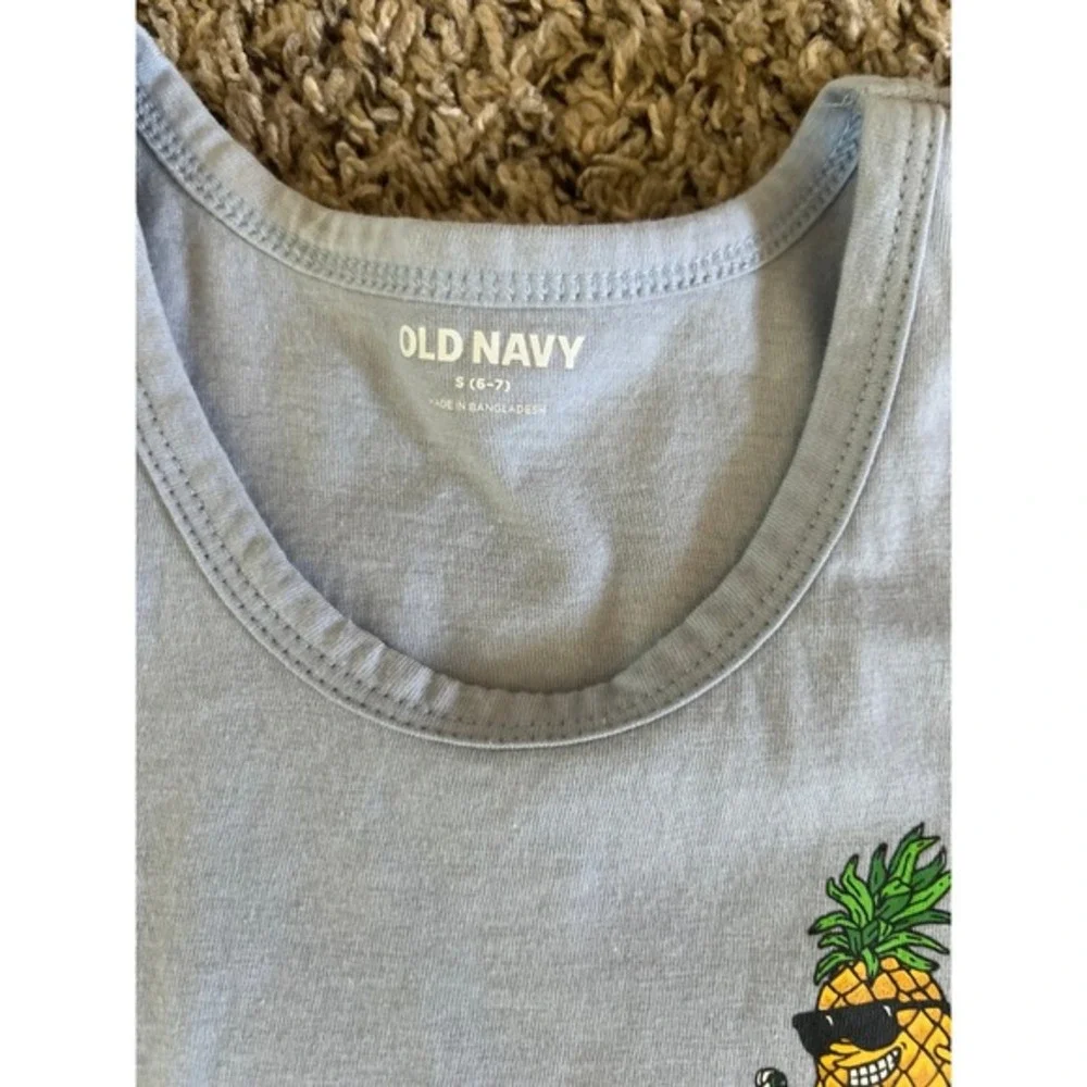 Old Navy‎ Boys Light Blue Pineapple guy riding a pizza bike Tank top Size 6/7